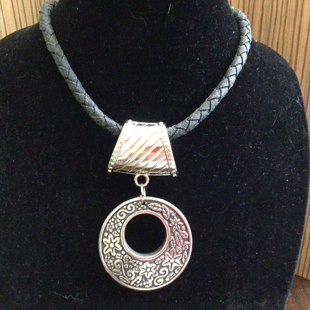 Braided rope necklace with silver pendant. Great shape.